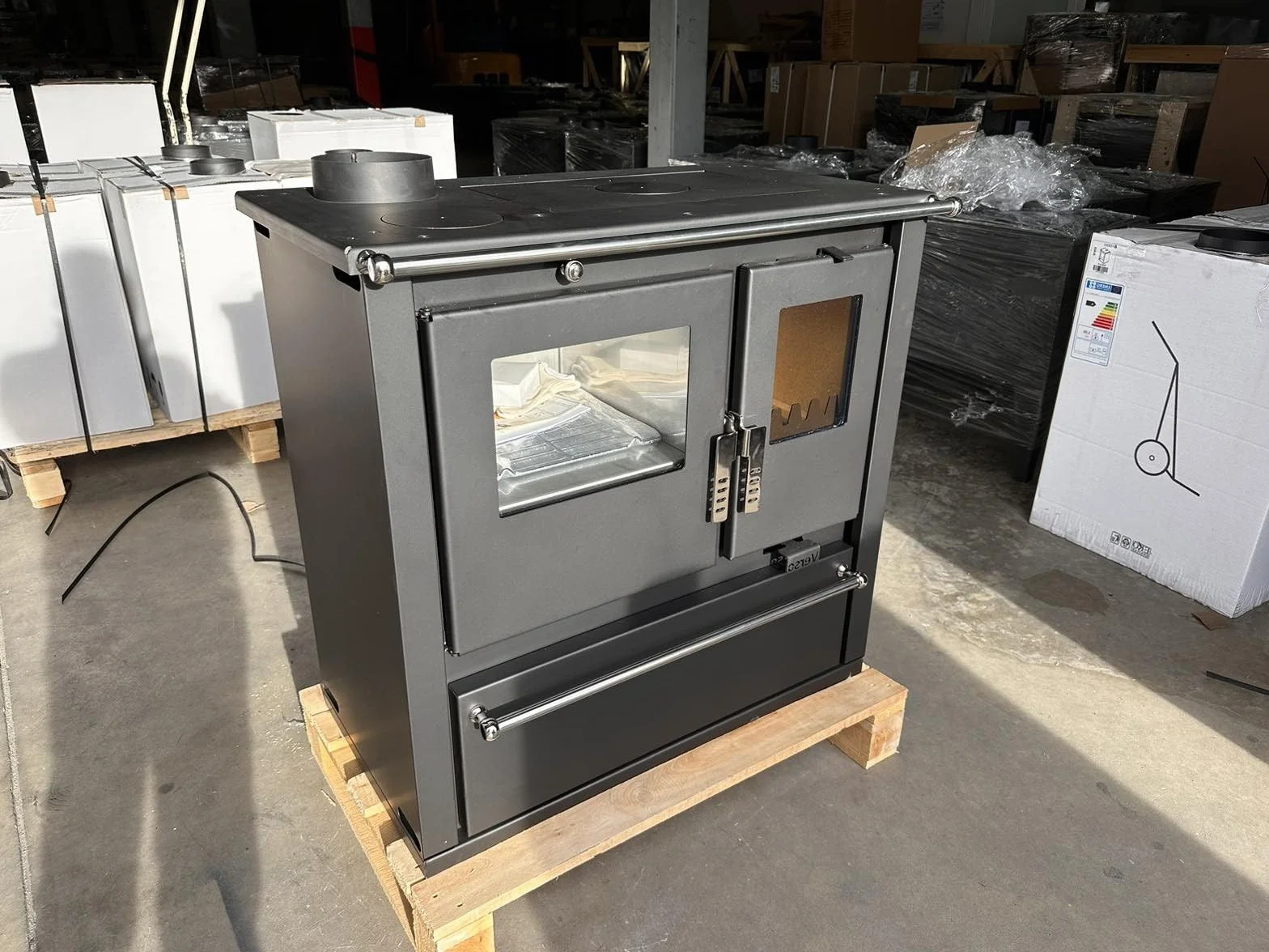 Poêle à bois Verso Cs Plus à gauche 7,7 kW grand compartiment de cuisson acier inoxydable